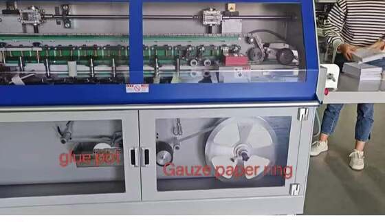 HX500B Book Back Spine Taping Machine wordt gebruikt voor Back Spine Taping op verschillende notebooks